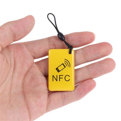 NFC ženkliukas telefone
