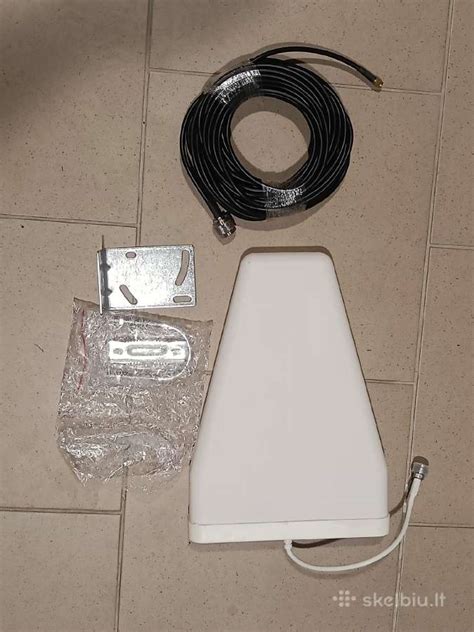 Nuotrauka: Lauko mobiliojo ryšio antena, pritvirtinta prie kamino