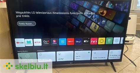 LG Smart TV su prijungtu Wi-Fi adapteriu ir kitais LG priedais